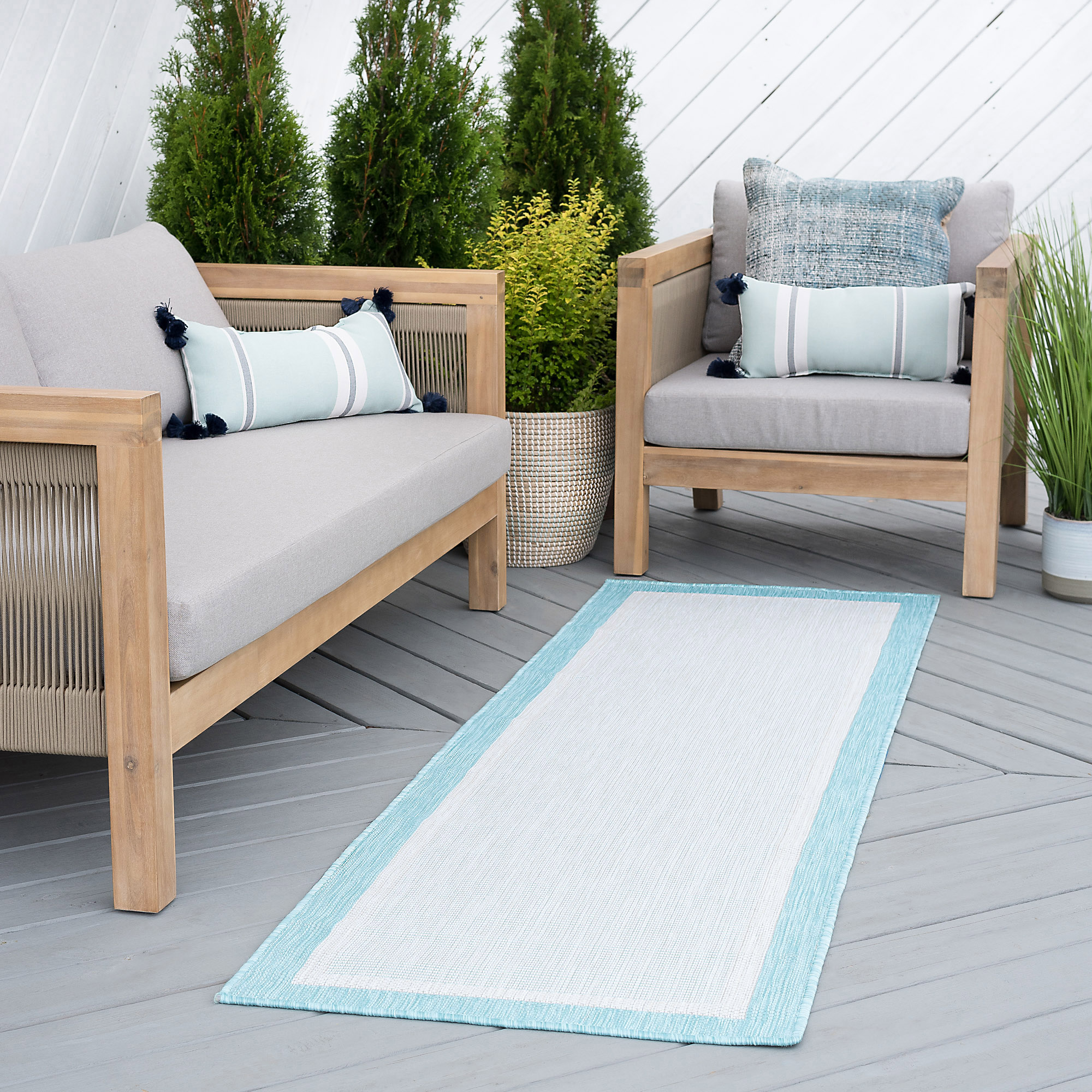 Dania Transitional Solid Border Outdoor Area Rug